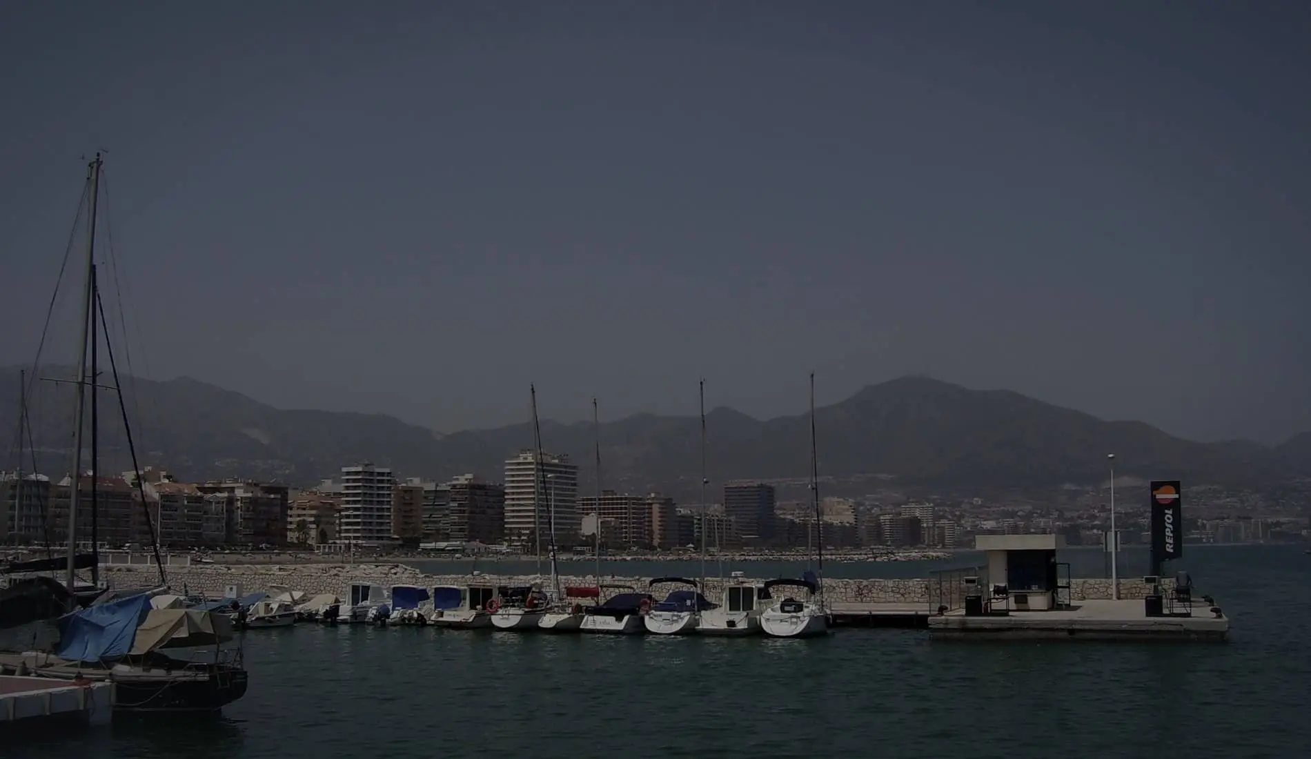 Fuengirola harbour with the mountains behind